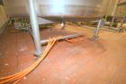 Used DCI 2,000 Gallon Stainless Steel Single Wall Mix Tank, Vertical. Dome Top/Cone Bottom. Top mounted agitation with bottom sweep blade and motor. Top entering baffle. Dual CIP Spray Ball. Mounted ...