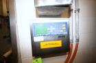 Used DCI 2,000 Gallon Stainless Steel Single Wall Mix Tank, Vertical. Dome Top/Cone Bottom. Top mounted agitation with bottom sweep blade and motor. Top entering baffle. Dual CIP Spray Ball. Mounted ...