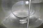 Used Dari-Kool 3,000 Gal. Stainless Steel Horizontal Jacketed Tank, with Vertical Agitation, CIP Spray Ball, and Air Valve, with Stainless Steel Exterior.