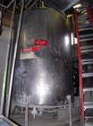 Used- Ertel Tank, 2000 gallon, stainless steel, vertical. Approximately 80