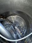 Used Feldmeier 1,700 Gallon 316 Stainless Steel Jacketed Tank. Double motion scraper agitation. Approximate 8' diameter X 4' straight side with approximate 45 degree cone bottom with 4
