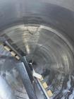 Used Feldmeier 1,700 Gallon 316 Stainless Steel Jacketed Tank. Double motion scraper agitation. Approximate 8' diameter X 4' straight side with approximate 45 degree cone bottom with 4