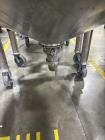 Used Tank, Feldmeier 1,000 Gallon, Stainless steel. Dish top, Cone Bottom, On casters with bottom discharge valve.