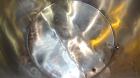 Used Filpaco Tank, 2000 Gallons, 304 Stainless Steel, Vertical. Approximate 86” Diameter X 81” straight side, open top with (2) covers, sloped bottom. Side bottom entering agitator with a (3) blade p...