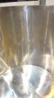 Used Filpaco Tank, 2000 Gallons, 304 Stainless Steel, Vertical. Approximate 86” Diameter X 81” straight side, open top with (2) covers, sloped bottom. Side bottom entering agitator with a (3) blade p...