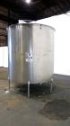 Used Filpaco Tank, 2000 Gallons, 304 Stainless Steel, Vertical. 86” Diameter X 84” straight side, open top with (2) covers, cone bottom. Side bottom entering agitator with a (3) blade prop driven by ...