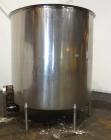 Used Filpaco Tank, 2000 Gallons, 304 Stainless Steel, Vertical. 86” Diameter X 84” straight side, open top with (2) covers, cone bottom. Side bottom entering agitator with a (3) blade prop driven by ...