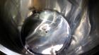 Used Filpaco Tank, 2000 Gallons, 304 Stainless Steel, Vertical. 86” Diameter X 84” straight side, open top with (2) covers, cone bottom. Side bottom entering agitator with a (3) blade prop driven by ...