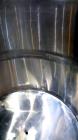 Used Filpaco Tank, 2000 Gallons, 304 Stainless Steel, Vertical. 86” Diameter X 84” straight side, open top with (2) covers, cone bottom. Side bottom entering agitator with a (3) blade prop driven by ...