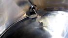 Used Filpaco Tank, 2000 Gallons, 304 Stainless Steel, Vertical. 86” Diameter X 84” straight side, open top with (2) covers, cone bottom. Side bottom entering agitator with a (3) blade prop driven by ...
