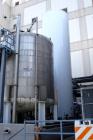 Used: Four Corp tank, approximately 6000 gallon, 316L stainless steel, vertical. Approximately 10' diameter x 11'6