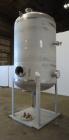 Used Four Corp Pressure Tank, Approximately 1,250 Gallon, 304 Stainless Steel.