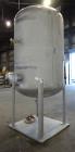 Used Four Corp Pressure Tank, Approximately 1,250 Gallon, 304 Stainless Steel.