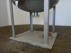 Used Four Corp Pressure Tank, Approximately 1,250 Gallon, 304 Stainless Steel.