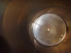 Used G&F Manufacturing Tank, 2500 Gallon, 316L Stainless Steel, Vertical.