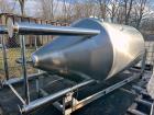Used Glacier Tanks Stainless Steel Brew Tank, 40 BBL (1,240 Gallon). 304 stainless steel. Cone bottom. Center bottom outlet. Side manway. On (4) legs. SN GT-V-3215.