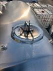 Used Glacier Tanks Stainless Steel Brew Tank, 40 BBL (1,240 Gallon). 304 stainless steel. Cone bottom. Center bottom outlet. Side manway. On (4) legs. SN GT-V-3215.