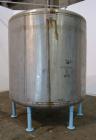 Used Groen Tank, 2500 Gallons, 304 Stainless Steel, Vertical. 90” Diameter x 78” straight side, dished top and bottom. Openings top (2) 1-5/8” threaded, 2-1/2” threaded, 15-3/4” man way with cover. 2...