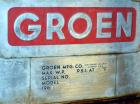 Used Groen Tank, 2500 Gallons, 304 Stainless Steel, Vertical. 90” Diameter x 78” straight side, dished top and bottom. Openings top (2) 1-5/8” threaded, 2-1/2” threaded, 15-3/4” man way, no cover. 2”...