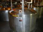 Used- Lee Industries Tank, 2000 Gallon, model DBTT, stainless steel, vertical. 76