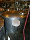 Used- Lee Metal Products Tank, 1500 Gallon, 316 Stainless Steel, Vertical. 76