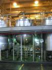 Used Lee Metal Products Tank, 1500 Gallon, 316 Stainless Steel, Vertical. 76'' Diameter x 56'' straight side, 304 stainless steel dished top, hemisperical bottom. Approximate 92'' overall depth. Open...