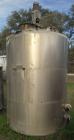 USED: Metal Equipment Company Tank, approximately 1,700 Gallons, Stainless Steel, Vertical, Insulated.  Approximate 78