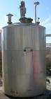 USED: Metal Equipment Company Tank, approximately 1,700 Gallons, Stainless Steel, Vertical, Insulated.  Approximate 78