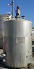 USED: Metal Equipment Company Tank, approximately 1,700 Gallons, Stainless Steel, Vertical, Insulated.  Approximate 78