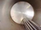 Used Mojonnier Tank, 1500 Gallon, Stainless Steel, Horizontal. Approximately 72