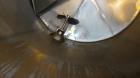 Used Mueller Tank, 1000 Gallons, 304 Stainless Steel, Vertical. 67” Diameter x 70” straight side, Open top with (2) covers, sloped bottom. Side bottom entering agitator with (3) blade prop driven by ...