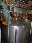 Used Mueller Tank, 2000 Gallon, Model F, Stainless Steel, Vertical. 76