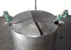 Used Mueller Tank, 1000 Gallons, 316 Stainless Steel, Vertical.  Approximately 76