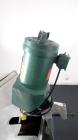 Used Mueller Tank, 1000 Gallon, 316 Stainless Steel, Vertical. Approximate 76” diameter x 57” straight side, open top with (2) covers, sloped bottom. (2) Lightnin clamp on agitators. (1) Model XJ-65V...