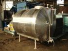 Used- Tank, 1200 gallon, stainless steel, horizontal. Approximately 66