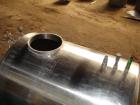 Used Tank, 1200 gallon, stainless steel, horizontal. Approximately 66