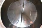 Used Tank, 2000 Gallon, 304 Stainless Steel Vertical. 84” Diameter x 80” straight side. Dished top, coned bottom. Off center top entering Lightnin air operated agitator, model N33AG-100. 1-1/2” Diame...