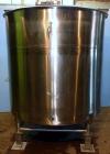 Used Tank, 1,200 Gallon, Stainless Steel, Vertical. Open top with lids, dished bottom. Side mounted level gauge and bridge mounted 1 hp agitator.  1-1/2’’ Center bottom outlet.  Mounted on (4) stainl...