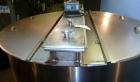 Used Tank, 1,200 Gallon, Stainless Steel, Vertical. Open top with lids, dished bottom. Side mounted level gauge and bridge mounted 1 hp agitator.  1-1/2’’ Center bottom outlet.  Mounted on (4) stainl...