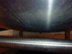 Used Tank, 1,200 Gallon, Stainless Steel, Vertical. Open top with lids, dished bottom. Side mounted level gauge and bridge mounted 1 hp agitator.  1-1/2’’ Center bottom outlet.  Mounted on (4) stainl...