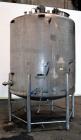 Used Tank, 1500 Gallon, 316 Stainless Steel, Vertical. Approximate 76” diameter x 72” straight side, dished top and bottom. Fixed stainless steel agitator mount with a UET agitator, model XCEL-6, out...