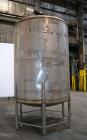 Used Tank, 1900 Gallon, 316 Stainless Steel, Vertical. Approximate 76” diameter x 92” straight side, dished top and bottom. Fixed stainless steel agitator mount with a UET agitator, model XCEL-6, out...