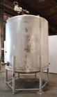 Used Tank, 1500 Gallon, 316 Stainless Steel, Vertical. Approximate 76” diameter x 72” straight side, dished top and bottom. Fixed stainless steel agitator mount with a UET agitator, model XCEL-6, out...