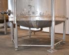 Used Tank, 1500 Gallon, 316 Stainless Steel, Vertical. Approximate 76” diameter x 72” straight side, dished top and bottom. Fixed stainless steel agitator mount with a UET agitator, model XCEL-6, out...