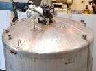 Used Tank, 1500 Gallon, 316 Stainless Steel, Vertical. Approximate 76” diameter x 72” straight side, dished top and bottom. Fixed stainless steel agitator mount with a UET agitator, model XCEL-6, out...