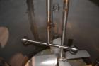 Used Tank, 1500 Gallon, 316 Stainless Steel, Vertical. Approximate 76” diameter x 72” straight side, dished top and bottom. Fixed stainless steel agitator mount with a UET agitator, model XCEL-6, out...