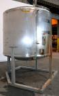 Used- Tank, 1650 Gallon, 316 Stainless Steel, Vertical. Approximate 84” diameter x 60” straight side, dished top and bottom....