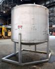 Used Tank, 1650 Gallon, 316 Stainless Steel, Vertical. Approximate 84” diameter x 60” straight side, dished top and bottom. Openings top 2” tri-clamp, (4) 3” tri-clamp, 2-1/2” tri-clamp, 23” man way ...