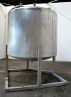 Used Tank, 1650 Gallon, 316 Stainless Steel, Vertical. Approximate 84” diameter x 60” straight side, dished top and bottom. Openings top 2” tri-clamp, (4) 3” tri-clamp, 2-1/2” tri-clamp, 23” man way ...