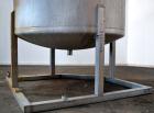 Used Tank, 1650 Gallon, 316 Stainless Steel, Vertical. Approximate 84” diameter x 60” straight side, dished top and bottom. Openings top 2” tri-clamp, (4) 3” tri-clamp, 2-1/2” tri-clamp, 23” man way ...